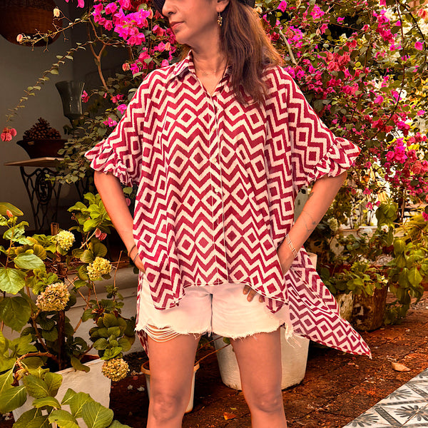 Friya shirt is the most versatile top! It’s a free size top for large sizes and for smaller sizes it can be tied at the waist to wear with shorts , skirts or pants . The short and long top gives a look of a dress from behind if worn with shorts.