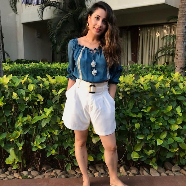 AVANNEDUBASH WEARING NESI BLUE TOP