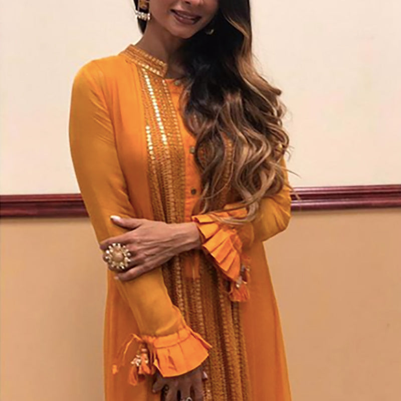 TANISHAA MUKERJI WEARING NISSI ORANGE DRESS